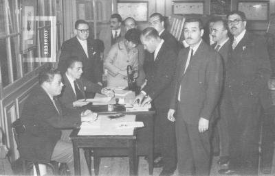 Filatelistas en la Federación de Comercio
