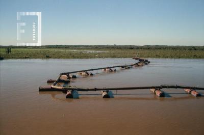 Trabajos en el río frente a la costanera