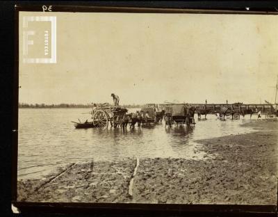 Lavado de carruajes en el río